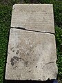 Broken stone tablet with inscriptions