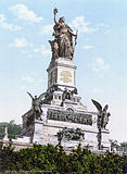 1877–1883: Niederwalddenkmal. Schillings jüngere Tochter Clara soll das Modell für die Germania gewesen sein.[1][2]