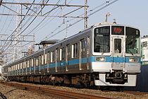 クヤ31形を牽引する1000形1051×4 (2015年2月15日 / 読売ランド前駅 - 生田駅)