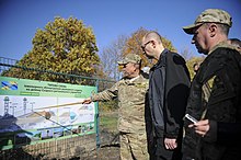 Ukrainian Prime Minister Arseniy Yatsenyuk visits the beginning of the construction of the Russia-Ukraine barrier, 15 October 2014 Yatsenyuk visit to Russia-Ukraine barrier, Oct 2014, 02.jpg