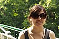 A young woman wearing outsized sunglasses while visiting Zoo Vienna, Austria. Has she got a black eye or what?!