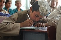 An Afghan student takes copious notes.jpg