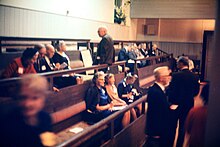 Quakers in a meeting room talking