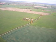 Aerial view of Beacon Hill farm, showing the route of Mareham Way through the fields. This aerial view is somewhat washed out because it was photographed through the side window of a light aircraft.