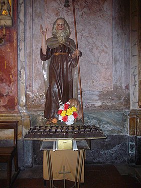 Staty föreställande den helige Antonius med en gris.