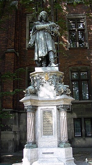 Monument to Copernicus beside the Jagiellonian University's Collegium Novum (New College).