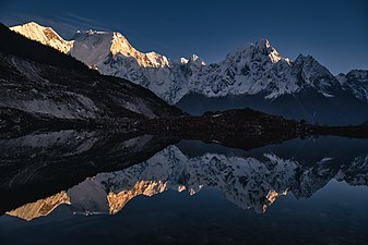Manaslu range and its reflection as seen from Bhimtang. Photograph: Samdesherpa