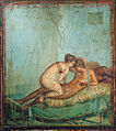 An erotic scene between a female and a male. Wall painting, Pompeii, 1st century.