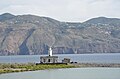 Leuchtturm an der ehemaligen Saline (im Hintergrund die Insel Lipari)