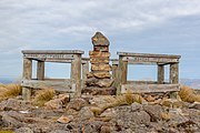 view of some structure on a mountain summit