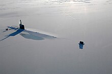 US Navy attack submarine USS Annapolis rests in the Arctic Ocean after surfacing through one metre of ice during Ice Exercise 2009 on 21 March 2009. USS Annapolis ICEX.jpg
