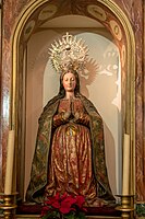 Statue religieuse faite par un couvent Franciscain d’Olivares, et peint par Francisco Pacheco dans les années 1600.  La figure mesure 1,09 m, représentant la jeune Vierge enceinte. Son ventre est composé d’un petit reliquaire où l’enfant Jésus en argent est placé. Conservé dans l'église paroissiale de Santiago Apóstol depuis le XIXe.