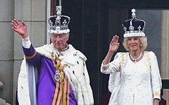 King Charles III and Queen Camilla during the coronation procession in the Gold State Coach.