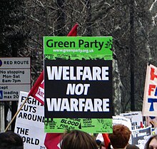 "Welfare not Warfare" sign, indicating the Green Party's policy towards social justice and non-violence Welfare Not Warfare.jpg