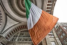 World's largest Irish flag in Boston. People who claim Irish descent constitute the largest ethnic ancestry in New England. World's largest Irish flag--swaying in the wind (Boston, MA) (13202190293).jpg