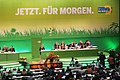 Slogan von Bündnis 90/Die Grünen gesetzt in der Schriftart Benton Sans. Bild stammt von der Bundesdelegiertenkonferenz 2007.