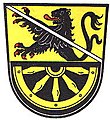 Gemeinde Enchenreuth Geteilt von Gold und Schwarz; oben ein wachsender, mit einer silbernen Schrägleiste überdeckter, rot bewehrter schwarzer Löwe, unten ein unterhalbes goldenes Rad mit fünf Speichen.[3]