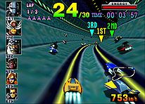 Hovercrafts navigate through a giant pipe in a course. Around the edge of the frame are two-dimensional icons relaying game information.