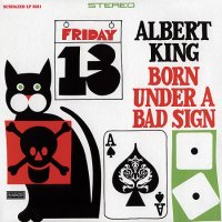 The album cover for Born Under a Bad Sign. The cover features a drawing of various objects related to superstition, including: a black cat, snake eyes, an ace of spades, and a calendar displaying the date Friday the 13th.