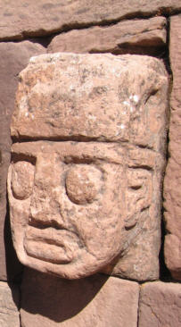 Closeup of a carved stone tenon-head embedded in wall of Tiwanaku's Semi-subterranean (Sunken) Temple Tiwanaku tenon head 20060613 0475.jpg