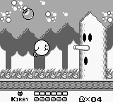 A screenshot of Kirby floating in Kirby's Dream Land