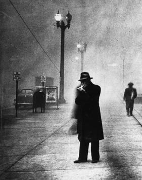 File:Man Lights Cigarette in Daylight - Black Tuesday 1939.jpg