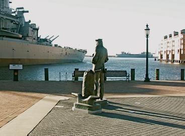 File:Lone Sailor watching BB-64.jpg