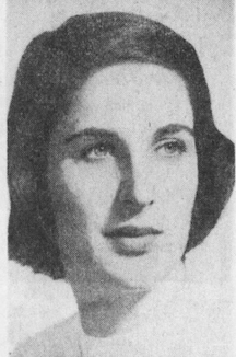 A young white woman with dark hair and light eyes