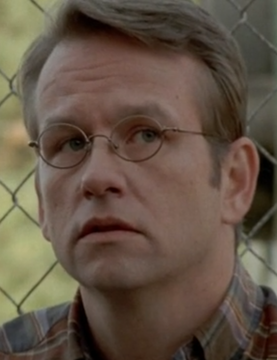 File:Dallas Roberts as Milton Mamet.png