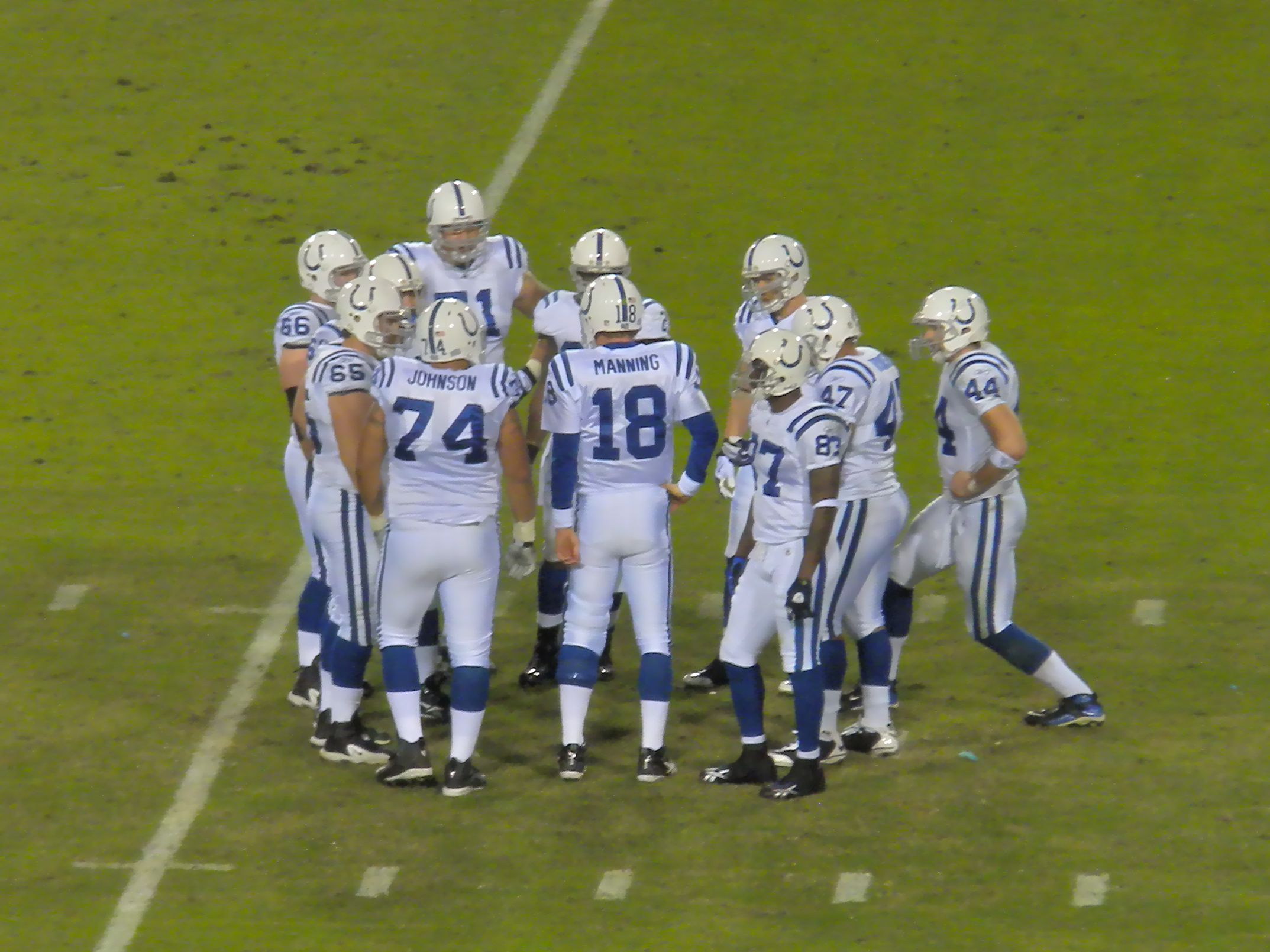 File:Peyton Manning huddle .