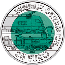 Монета с темно-зеленым центром и серебристым внешним ободком. На ободе написано: Republik Österreich 25 Euro. В центре представлены электрический и паровой локомотивы.