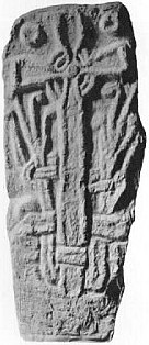 Black and white photograph of an inscribed mediaeval cross-slab