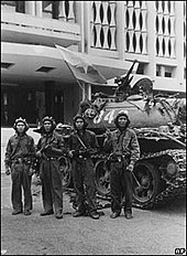 Victorious PAVN troops at the Presidential Palace, Saigon NVA pose for picture in Presidential Palace at end of Vietnam war.jpg