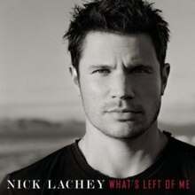 A black-and-white image of Lachey wearing a black t-shirt, with his right side covered in shadows. The artist's name and album title appear below him, colored white and red respectively.