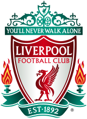 The words "Liverpool Football Club" are in the centre of a pennant, with flames either side. The words "You'll Never Walk Alone" adorn the top of the emblem in a green design, "EST 1892" is at the bottom.