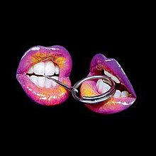 A picture of two colored mouths on a black background pulling a pin
