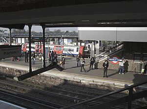 A Jubilee line train arriving on platform 4, taken from Metropolitan line platform 1