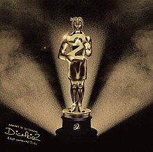 A drawing of an Oscars trophy with dreadlocks holding a big number 2, with three spotlights highlighting the light brown background.