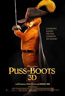 Theatrical poster showing Puss in Boots, an orange cat wearing a hat with a feather on, boots, and a cape in the black background. Tagline in gold to the side reads "Looking Good Never Looked So Good," with "Puss in Boots 3D" in large gold lettering underneath.