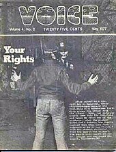 A picture of the black-and-white cover of the May 1977 issue of "The Voice." The word "Voice" is printed in bubble letters at the top of the cover. The cover picture is of a male with his hands extended away from his body as a police officer interacts with him. The cover story's title, "Your Rights," is located on the picture's left-hand side.