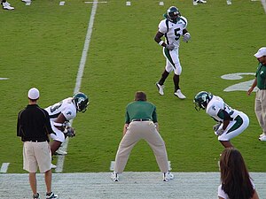 Tulane players warming up for a game against Texas