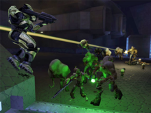 Protagonist Master Chief (left) fighting Flood in Halo: Combat Evolved (2001) Halo-flood-forms-library.png