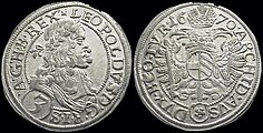 Silver coin of Leopold I, 3 Kreuzer, dated 1670. The Latin inscription reads (obverse): LEOPOLDVS DEI GRATIA ROMANORVM IMPERATOR SEMPER AVGVSTVS GERMANIAE HVNGARIAE BOHEMIAE REX (reverse):ARCHIDVX AVSTRIAE DVX BVRGVNDIAE COMES TYROLIS 1670. In English: "Leopold, by the Grace of God, Emperor of the Romans, always August, King of Germany, Hungary, and Bohemia, Archduke of Austria, Duke of Burgundy, Count of Tyrol, 1670."