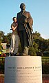 Skudrafan1 standing with the statue of Robert H. Jackson in Jamestown, New York.