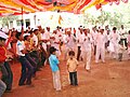 Devotees chanting Shri Gajanan Maharaj's name to the tune of cymbals and dholki.