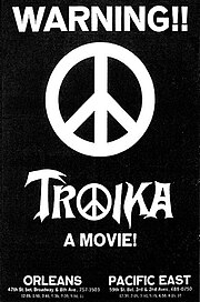A peace symbol imposed over a black background with the film's title and screening dates