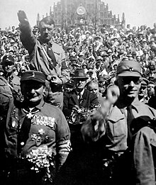 Hitler and Hermann Goring (first row left) saluting at a 1928 Nazi Party rally in Nuremberg Hitler 1928 crop.jpg