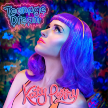 Upper bust of a purple-haired woman staring at the upper left of the picture. She is standing in front of a blurred multicolored painting. In the upper left, the words "Teenage Dream" are written in neon light blue letters inside a neon pink sign. Below her neck, the words "Katy Perry" are written in candy-like pink letters.