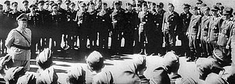 Calais, September 1940. Goring giving a speech to pilots about the change in tactics: to bomb London instead of the airfields Goering giving a speech to his fighter pilots near Calais September 1940.jpg