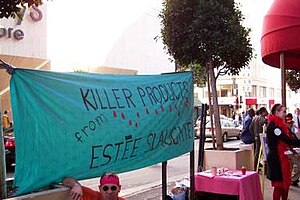 QUIT activists outside Macy's San Francisco store on Valentine's Day, 2004. Banner says, "Killer Products from Este Slaughter."